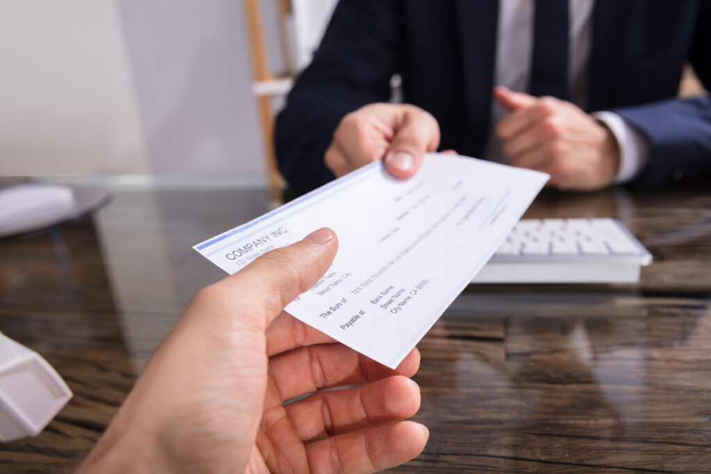 Should Notary Signing Agents Be Paid at the Time of Service in Real Estate Transactions: Weighing Both Sides of the Debate